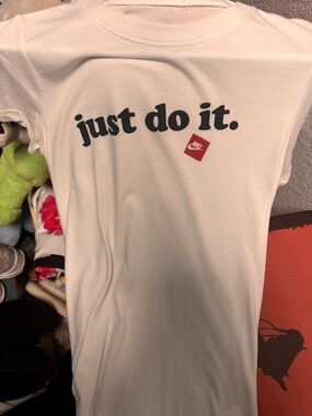 Nike White Tee with Black 'just do it.' Text and Red Logo